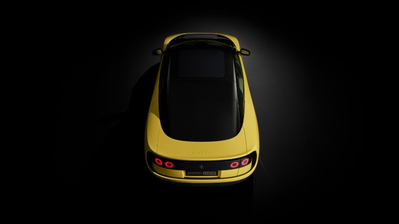 Rear end of a yellow Ferrari Luce