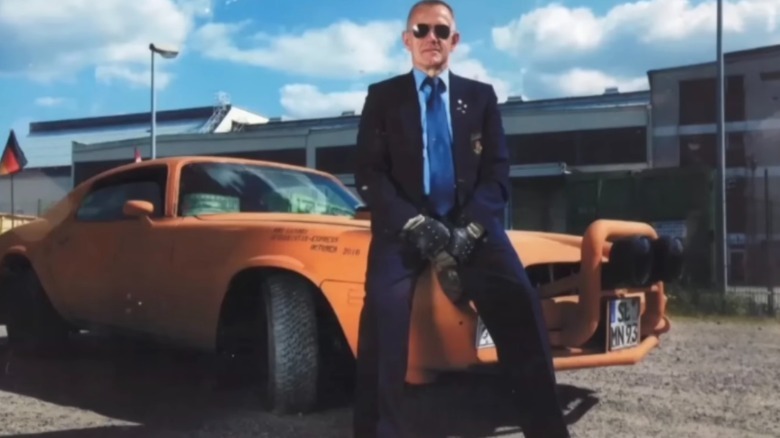 Helge Meyer sitting on the Ghost Camaro