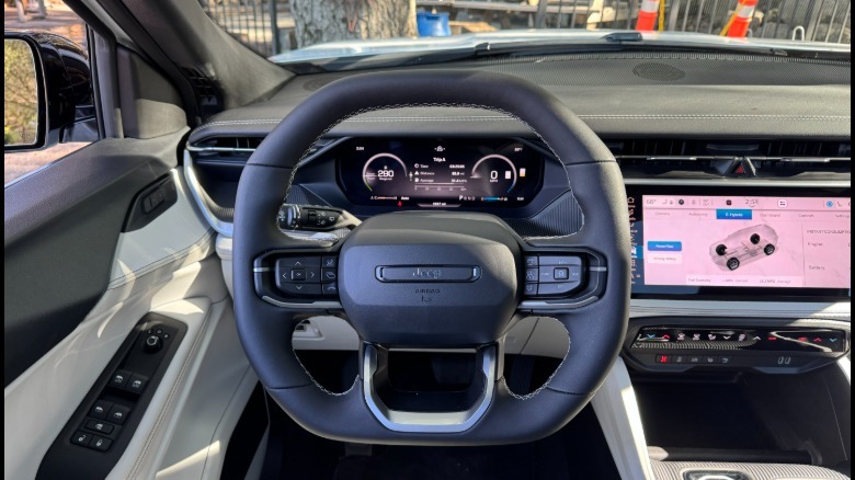 A photo of the driver's POV in the new Cherokee with a white and black interior