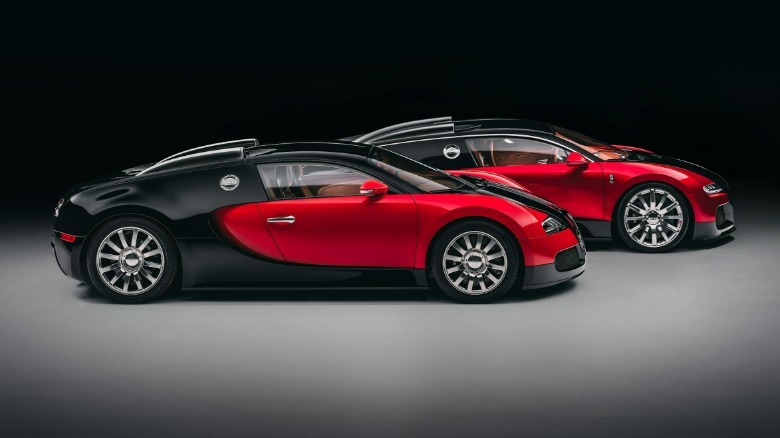 A red and black Bugatti Veyron next to the Bugatti F.K.P. Hommage