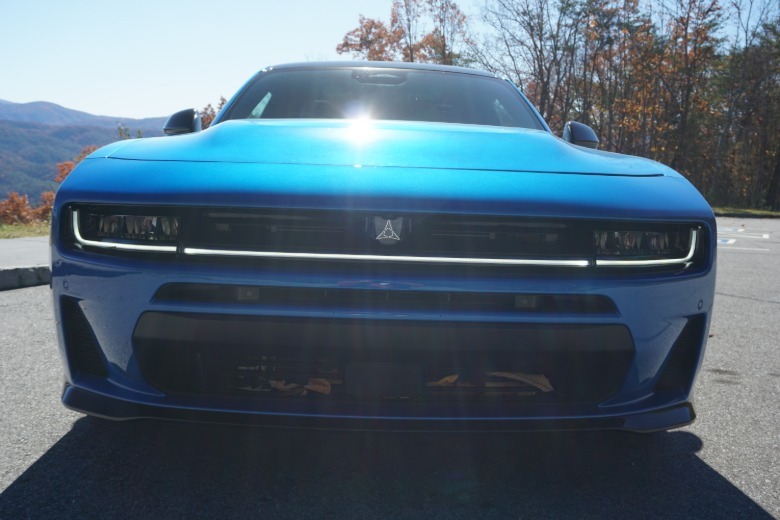 Front position of a bluish 2026 Dodge Charger Sixpack Scat Pack