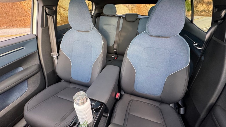 A look back at the seats inside the EX30 with their blue and black upholstery