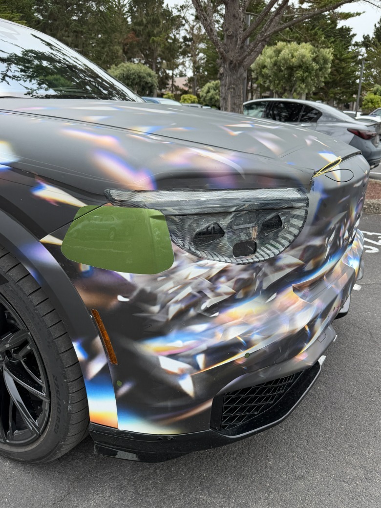 Front end detail of a camouflaged Bentley Torcal prototype