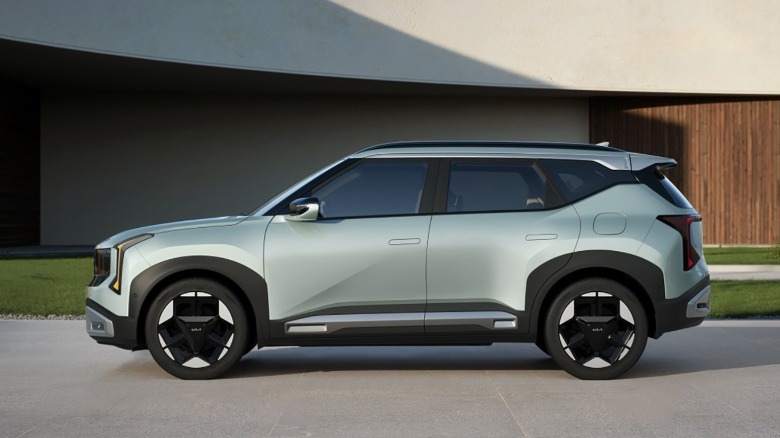 Side view of a light green 2027 Kia Seltos